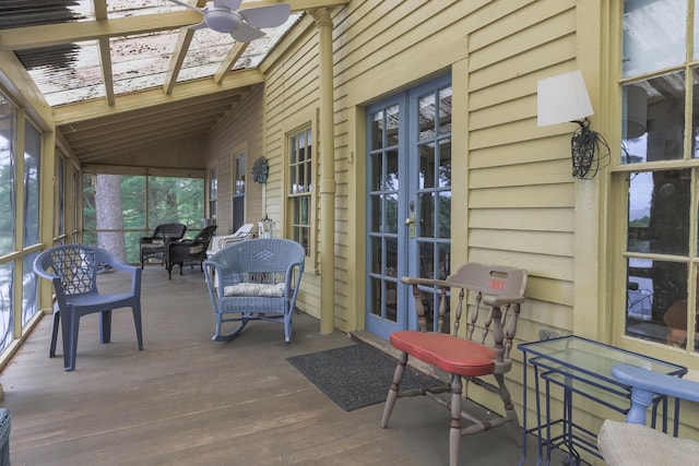 wooden deck with french doors and ceiling fan