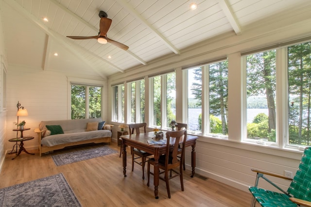 sunroom featuring wooden ceiling, visible vents, vaulted ceiling with beams, and ceiling fan