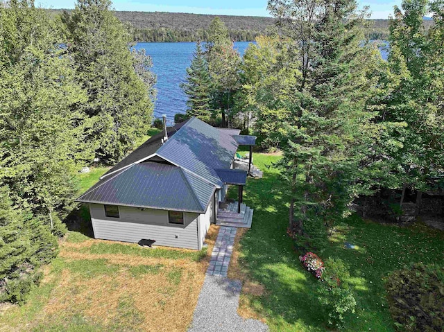 bird's eye view featuring a water view and a wooded view