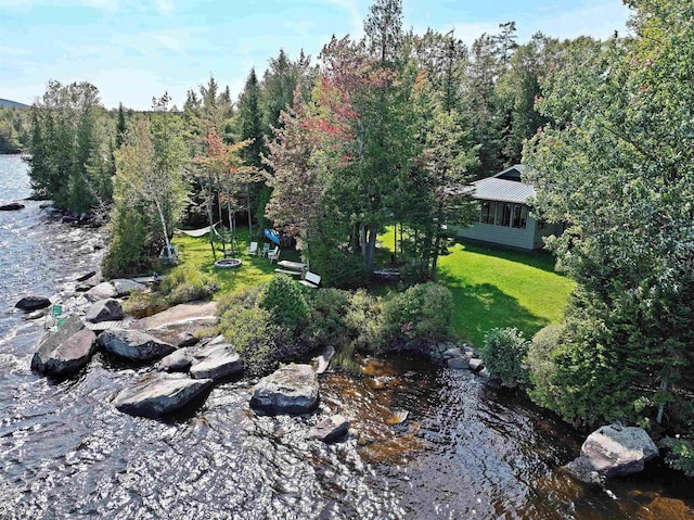 aerial view featuring a view of trees