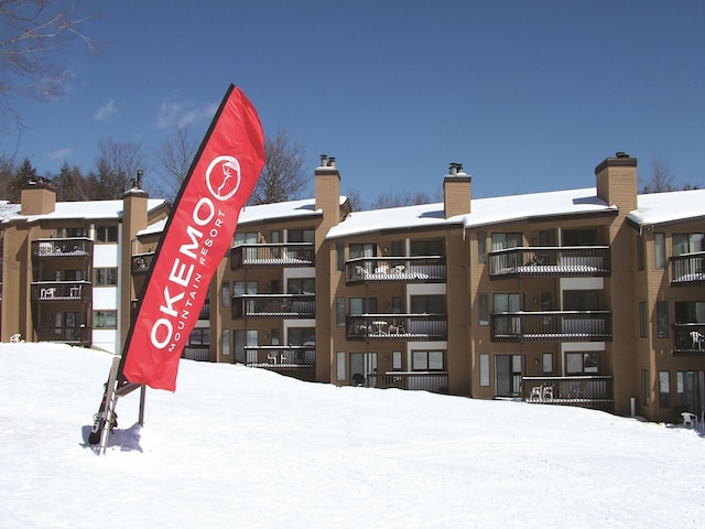 view of snow covered building