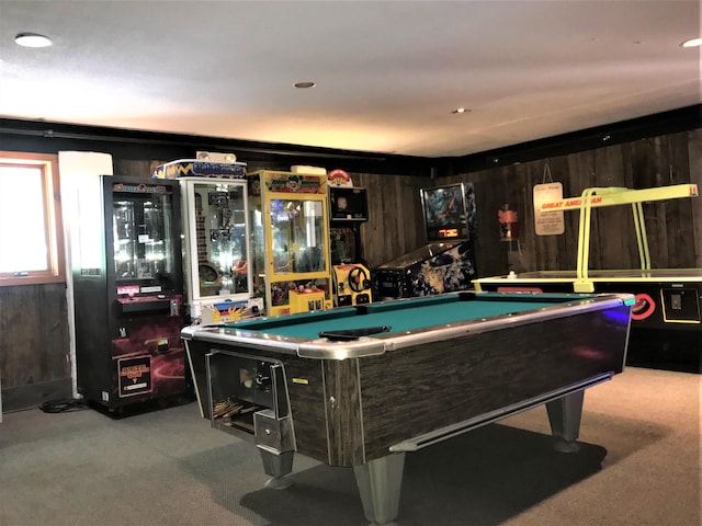 playroom with light carpet, pool table, and wooden walls