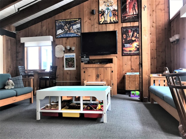 recreation room with lofted ceiling with beams, wooden walls, and carpet floors