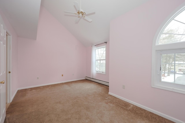 empty room featuring a baseboard radiator, a ceiling fan, light carpet, high vaulted ceiling, and baseboards