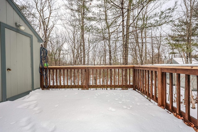 view of snow covered deck