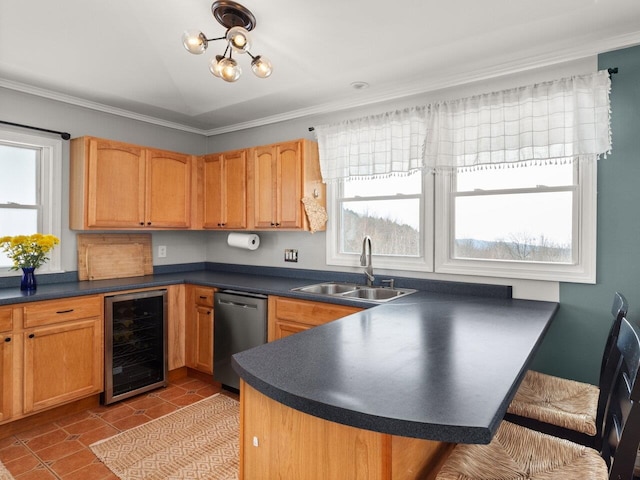 kitchen with beverage cooler, a peninsula, a sink, stainless steel dishwasher, and dark countertops