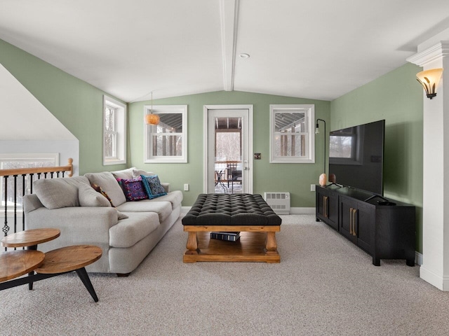 living room with light colored carpet, lofted ceiling with beams, and baseboards