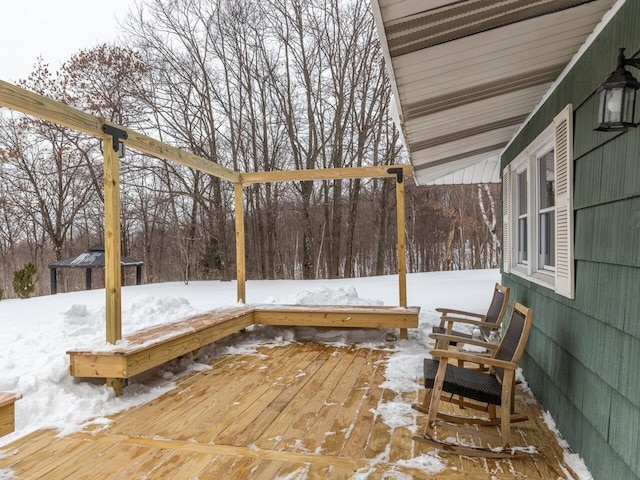 view of snow covered deck