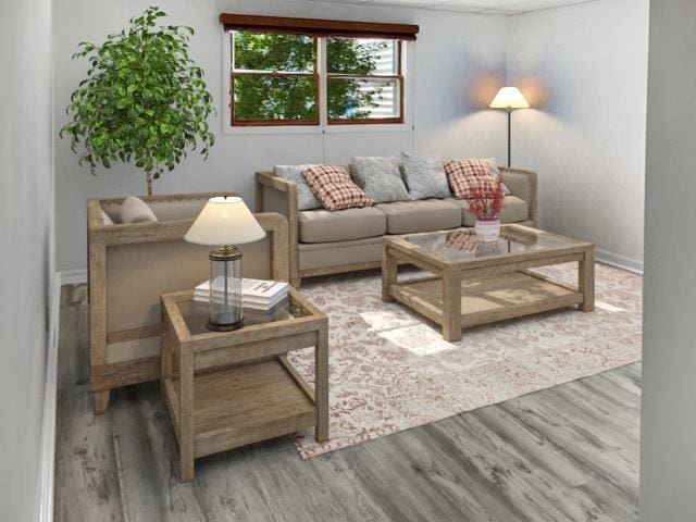 living room with wood finished floors and baseboards