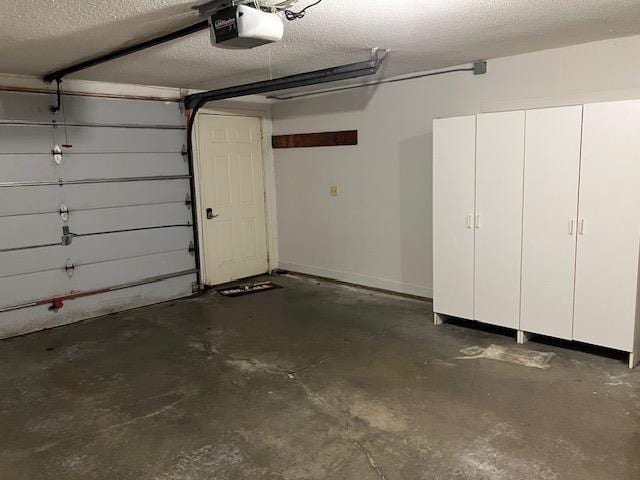 20 Gates Rd Unit 19, Marlborough, NH 03455 - garage featuring a garage door opener