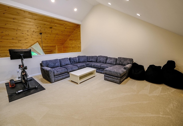 carpeted living room with recessed lighting, vaulted ceiling, and baseboards