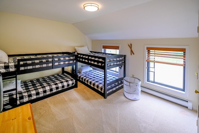 carpeted bedroom featuring vaulted ceiling and baseboard heating