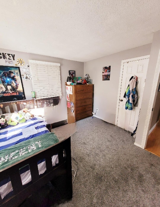 bedroom featuring a textured ceiling