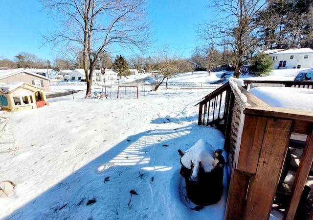 view of yard layered in snow