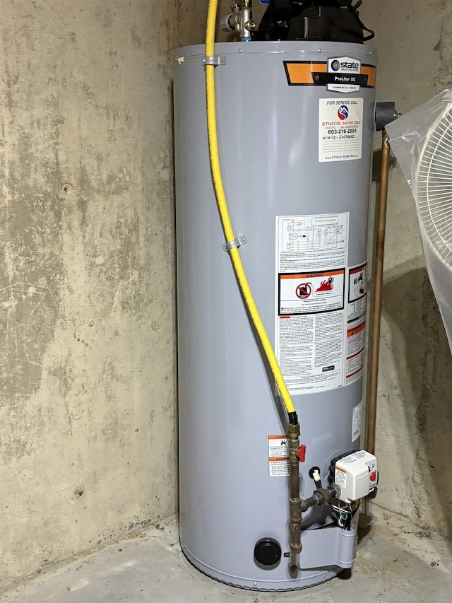 utility room with water heater