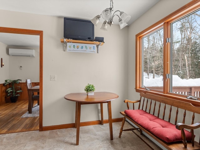 16 Ridge Rd, Essex, VT 05452 - living area with baseboards, an AC wall unit, and a notable chandelier