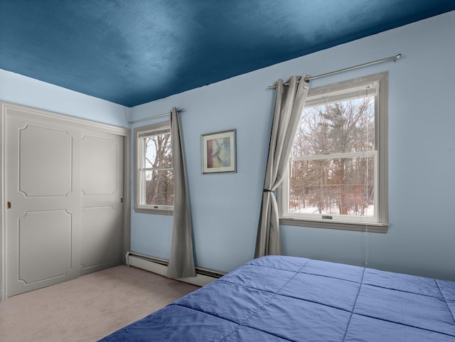 16 Ridge Rd, Essex, VT 05452 - bedroom with a closet, baseboard heating, and carpet