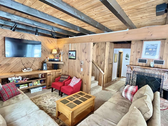 carpeted living room with wooden ceiling, wooden walls, a fireplace, stairway, and beam ceiling