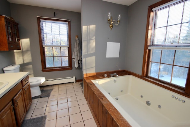 bathroom with toilet, baseboard heating, vanity, tile patterned flooring, and a jetted tub