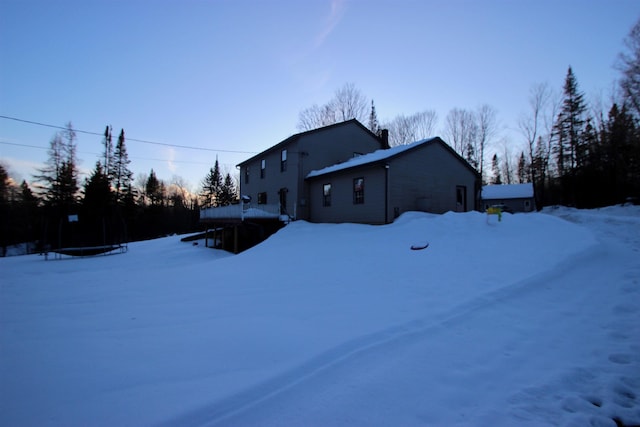 view of snow covered property