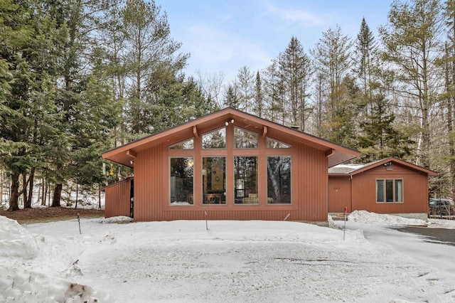 view of snow covered house