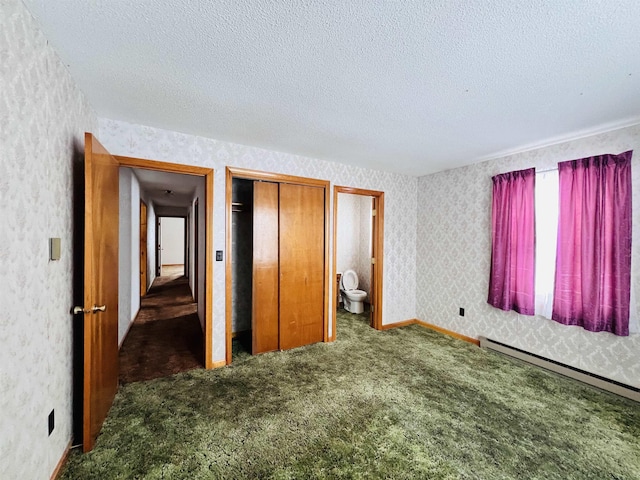 unfurnished bedroom with a textured ceiling, a baseboard radiator, carpet flooring, and wallpapered walls