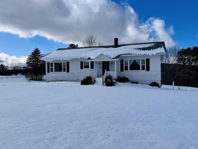 ranch-style house with a chimney