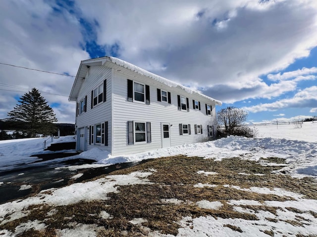 view of snow covered property