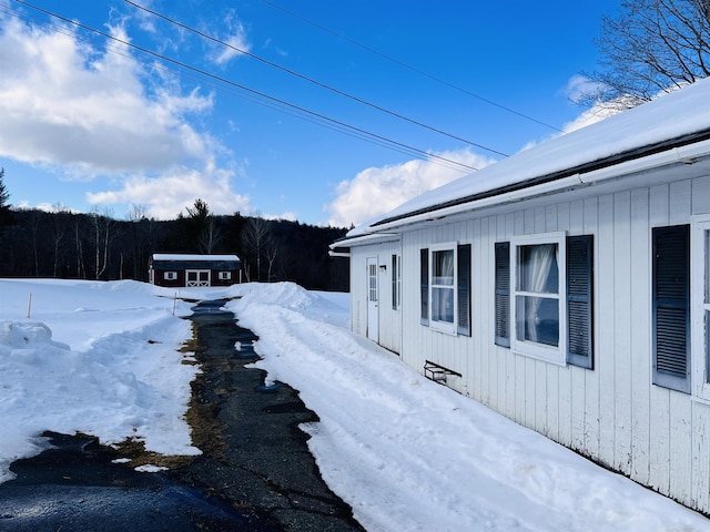 view of snow covered property