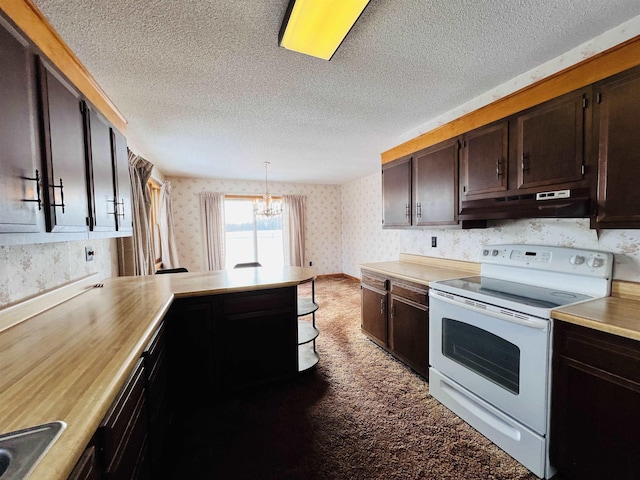 kitchen with a textured ceiling, under cabinet range hood, white electric range, dark brown cabinets, and wallpapered walls