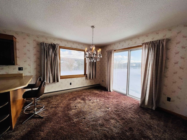 unfurnished dining area featuring a textured ceiling, a baseboard heating unit, carpet flooring, and wallpapered walls