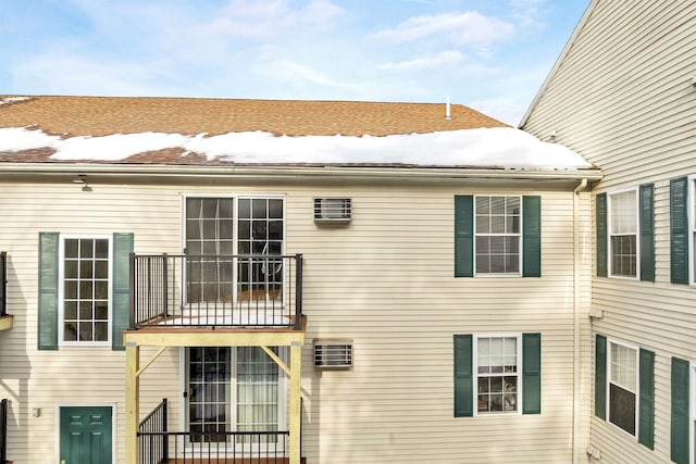 rear view of house with a balcony