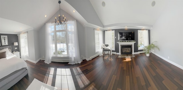 interior space with baseboards, a fireplace, a chandelier, and wood finished floors