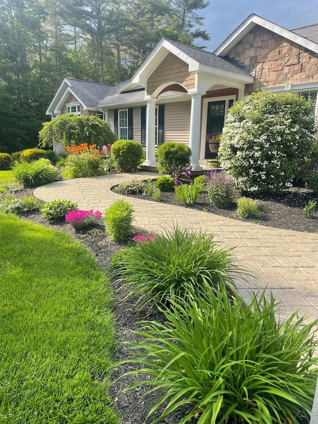 view of front of house with stone siding