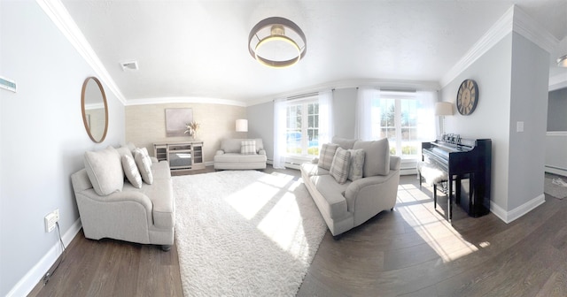 living area featuring ornamental molding, visible vents, baseboards, and wood finished floors