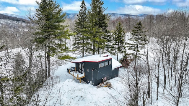 165 Upper Round Top Ext, Plymouth, VT 05056 - snowy aerial view with a mountain view and a view of trees