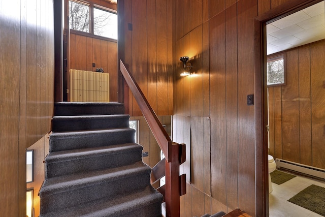 165 Upper Round Top Ext, Plymouth, VT 05056 - stairs with baseboard heating and wooden walls