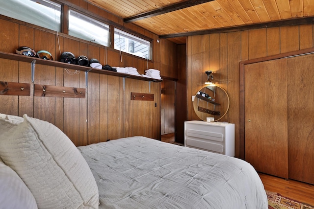 165 Upper Round Top Ext, Plymouth, VT 05056 - bedroom featuring wooden ceiling, wooden walls, beam ceiling, and wood finished floors