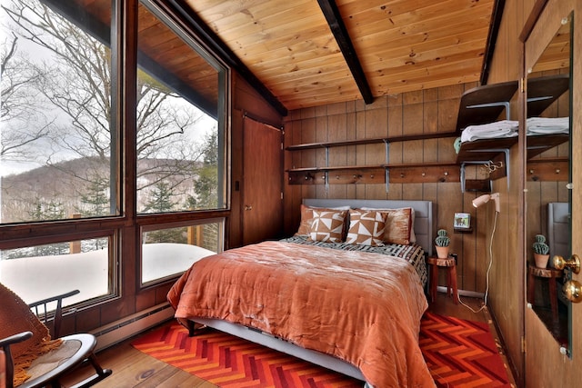 165 Upper Round Top Ext, Plymouth, VT 05056 - bedroom featuring wooden ceiling, wood walls, a baseboard radiator, and vaulted ceiling with beams