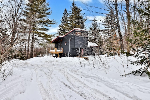 165 Upper Round Top Ext, Plymouth, VT 05056 - exterior space with a garage and a deck