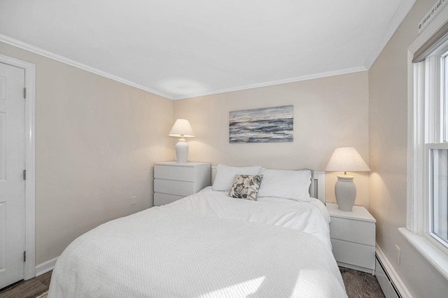 bedroom featuring baseboards, a baseboard radiator, wood finished floors, crown molding, and multiple windows