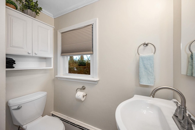 bathroom with ornamental molding, a baseboard radiator, a sink, and toilet