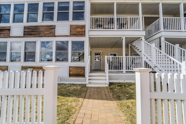 property entrance with covered porch