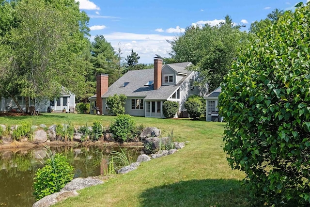 view of yard with a water view