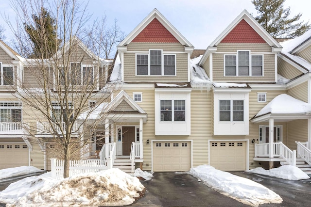 view of front of property with driveway and an attached garage