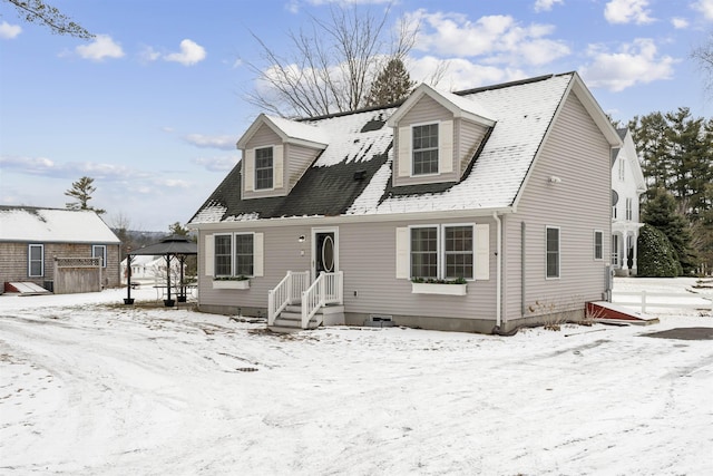 cape cod house featuring a gazebo