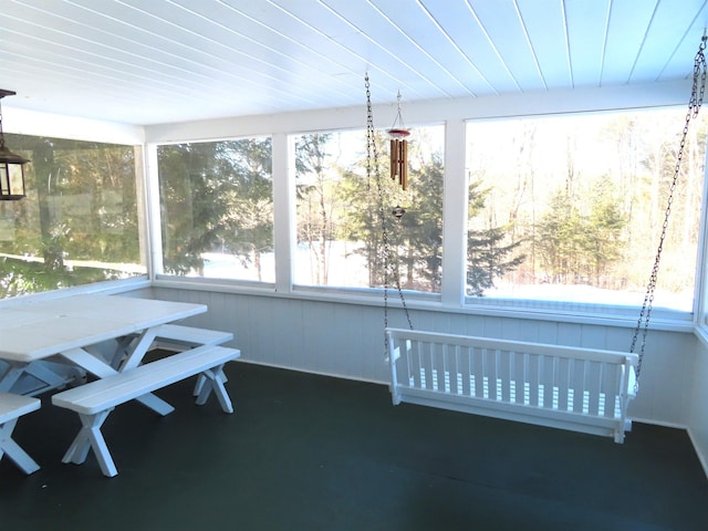 unfurnished sunroom with radiator