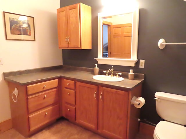 half bath with toilet and vanity