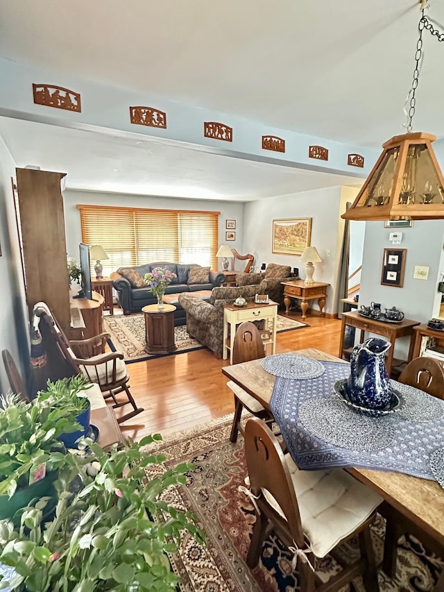 dining room with wood finished floors