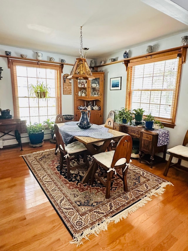 dining area with light wood finished floors